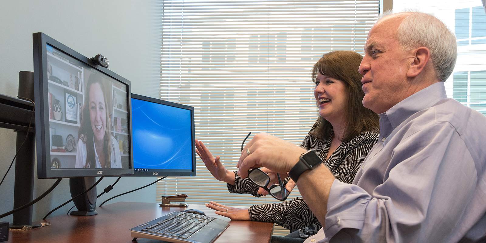 Mike Moffit, CPA consulting with a client virtually with a video call.
